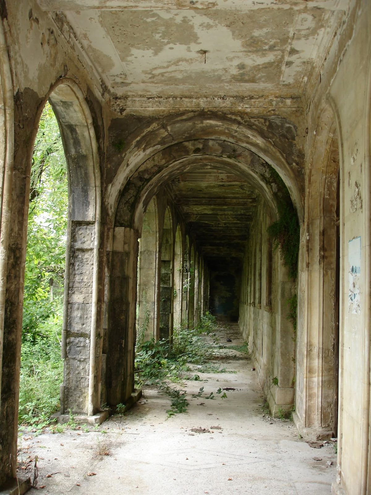 A long colonnade: light at the end of the corridor.