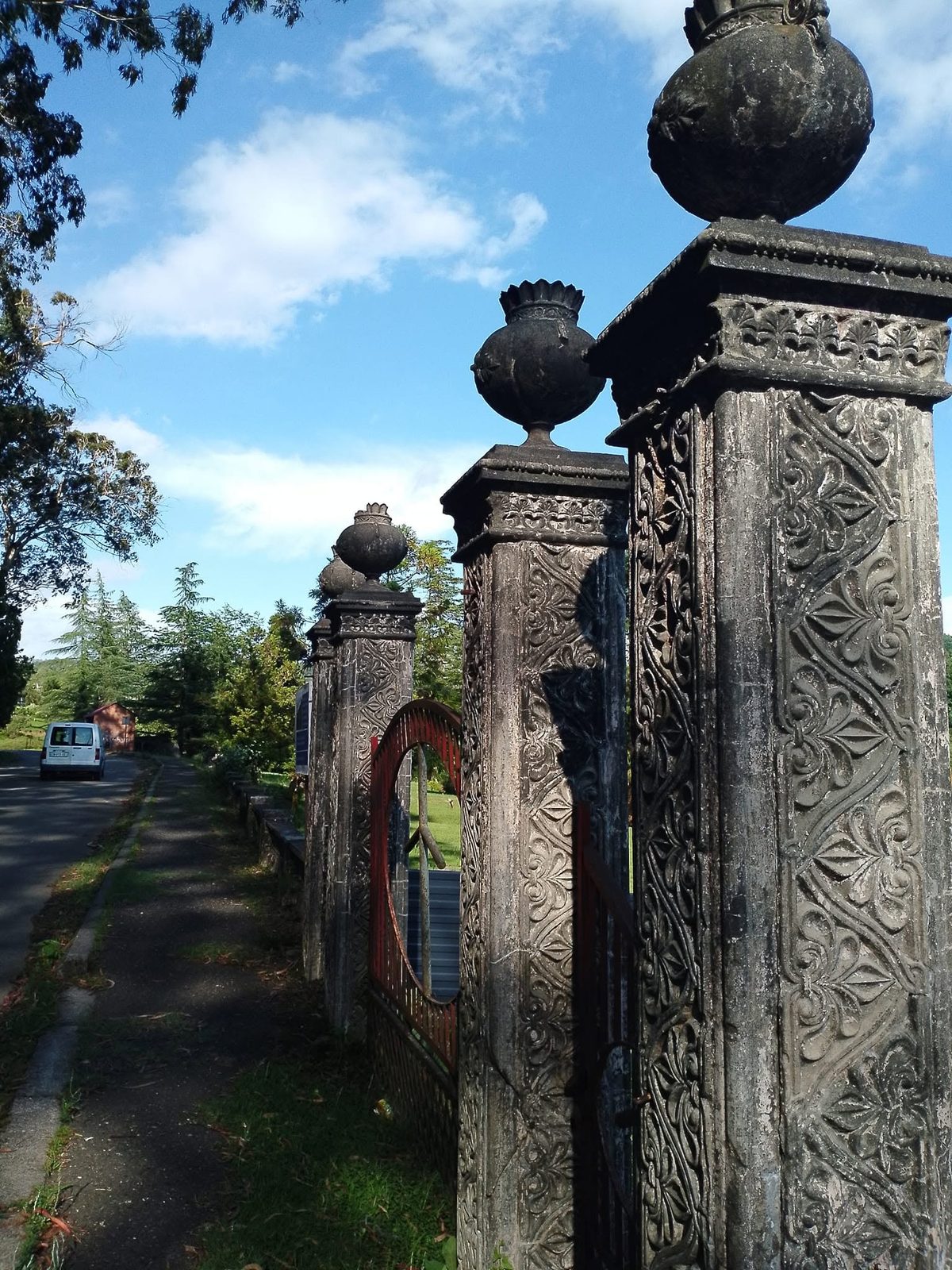 Carved stone pillars by the road.